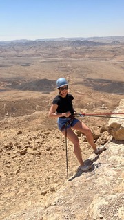 Sandra Hodes hiking through a desert landscape
