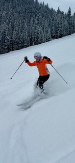 Sandra Hodes skiing through fresh snow